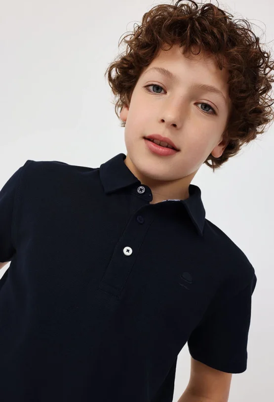 Polo piqué para niño en color azul marino